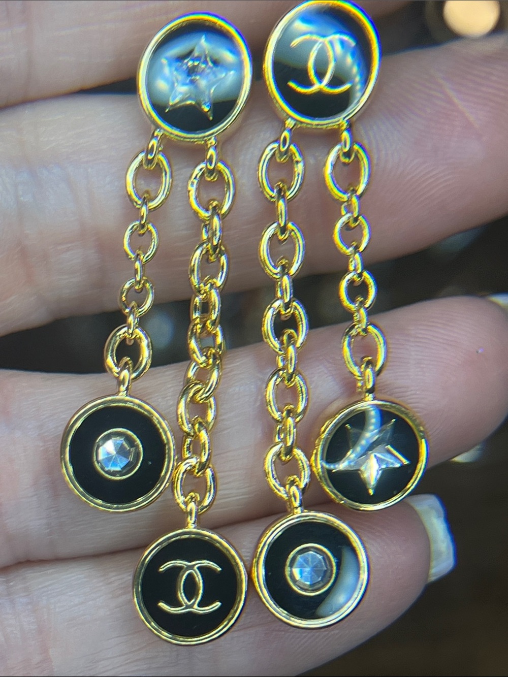 Goldtone Black Enamel Dangle Logo Earrings
